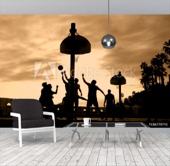 Picture of Basketball players at sunset